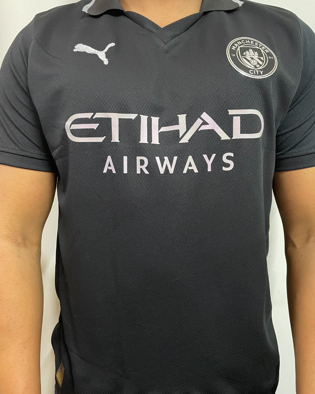 15491719455-catalogo-bfbfb4249bb9a5547817681631970482-1024-1024.png Camiseta Man City II Preta 2025/26 - Imagem 1