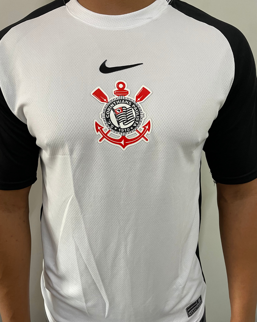15491719497-catalogo-1-dd45db25ce42836a2617681655371387-1024-1024.png Camisa Corinthians Tradicional I 2025/26 - Imagem 1