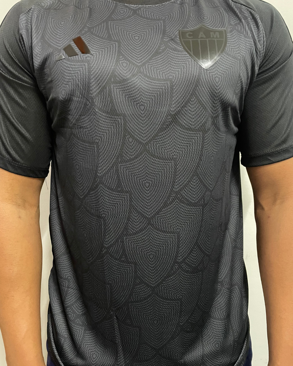 15491719740-catalogo-a5c639c81ef3dcf55817682426558470-1024-1024.png Camisa Atlético Mineiro All Black Ed Especial 2025 - Imagem 1